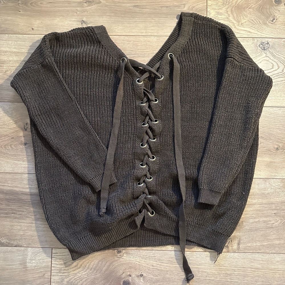 S/M sweater, lace up in the back.